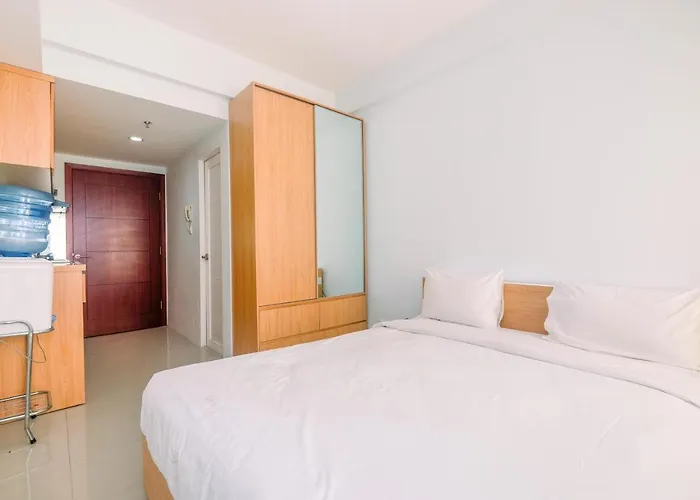Modern Style Studio Tamansari Mahogany Karawang Apartment With City View By Travelio